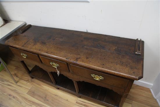 An 18th century oak dresser, W.5ft 1in. H.6ft 5in.